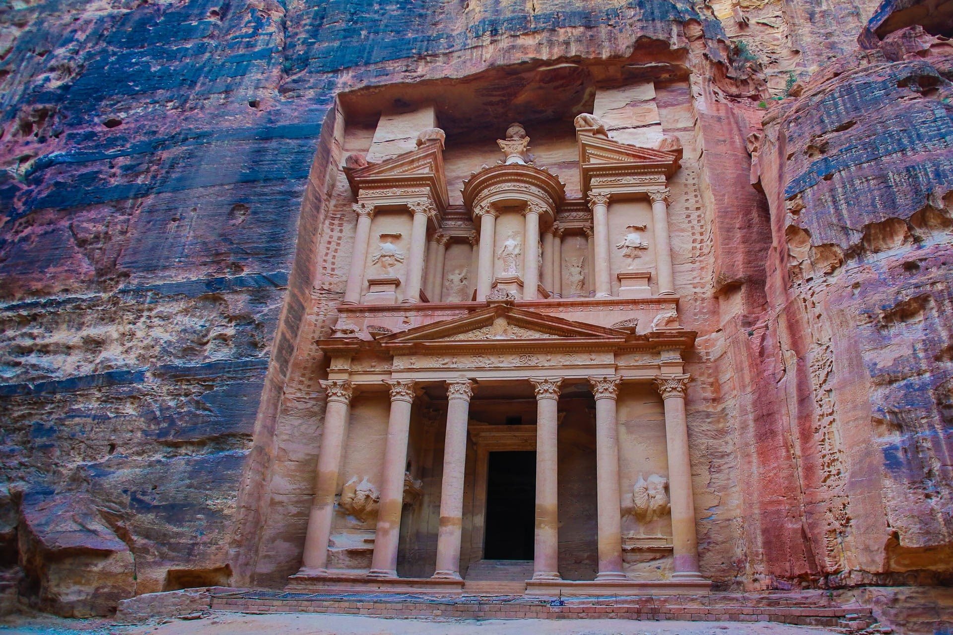 Desert camp under a wide night sky strewn with stars